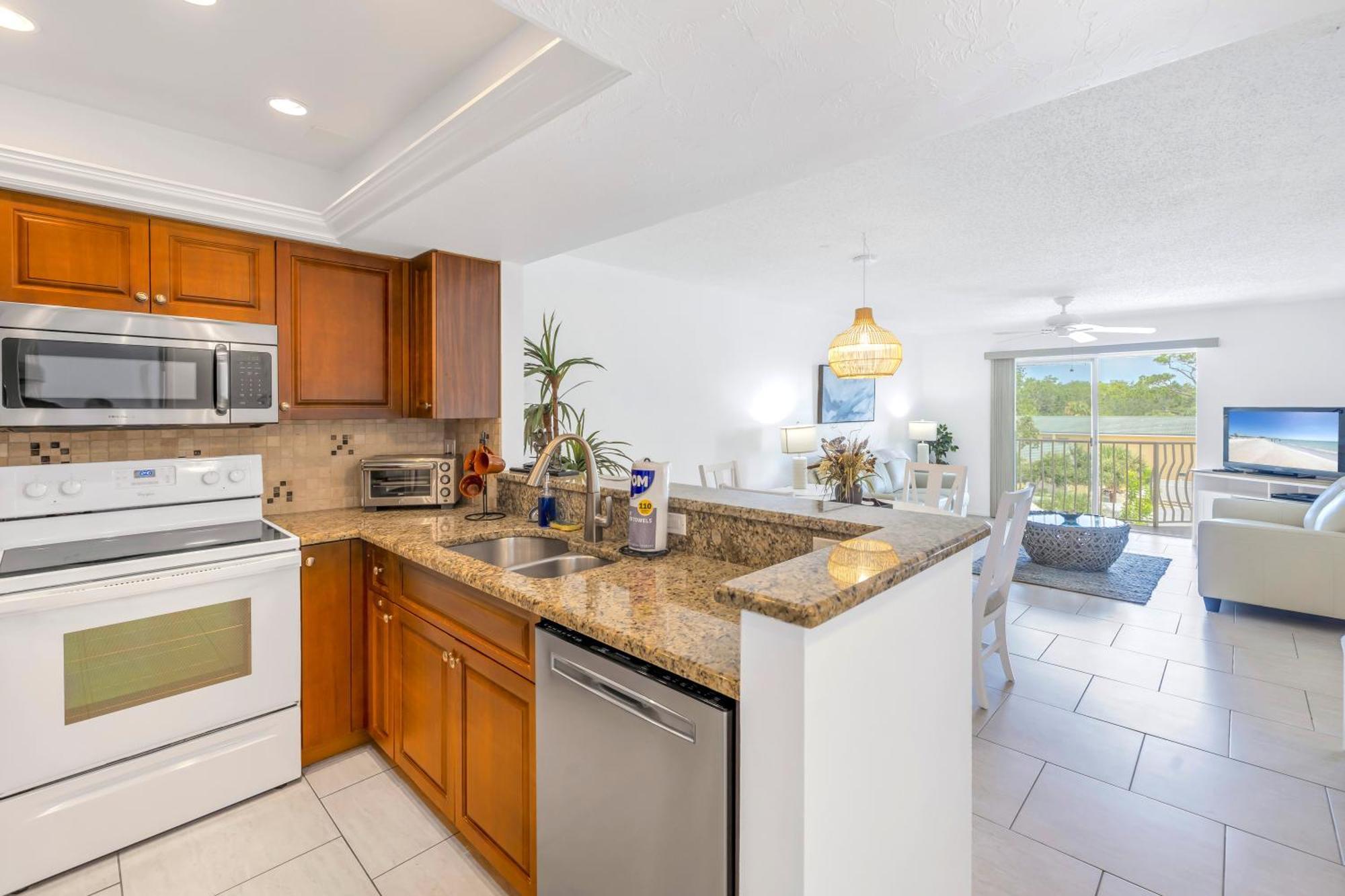 New Listing! Bayside Unit, Balcony, Private Beach!